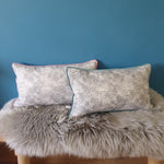 Load image into Gallery viewer, Abstract animal print velvet cushion with seafoam velvet piping
