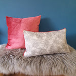 Load image into Gallery viewer, Abstract animal print velvet cushion with Tea Rose velvet piping
