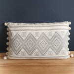 Load image into Gallery viewer, Aztec Grey Large Rectangular Cushion with Pom Poms.
