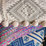 Load image into Gallery viewer, Aztec Grey Large Rectangular Cushion with Pom Poms.
