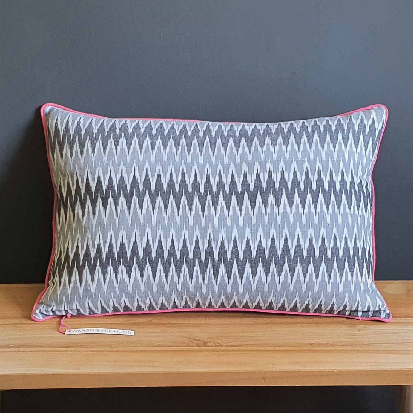 Damn The Weather! Large Rectangular Ikat Cushion with Rose Pink Piping.