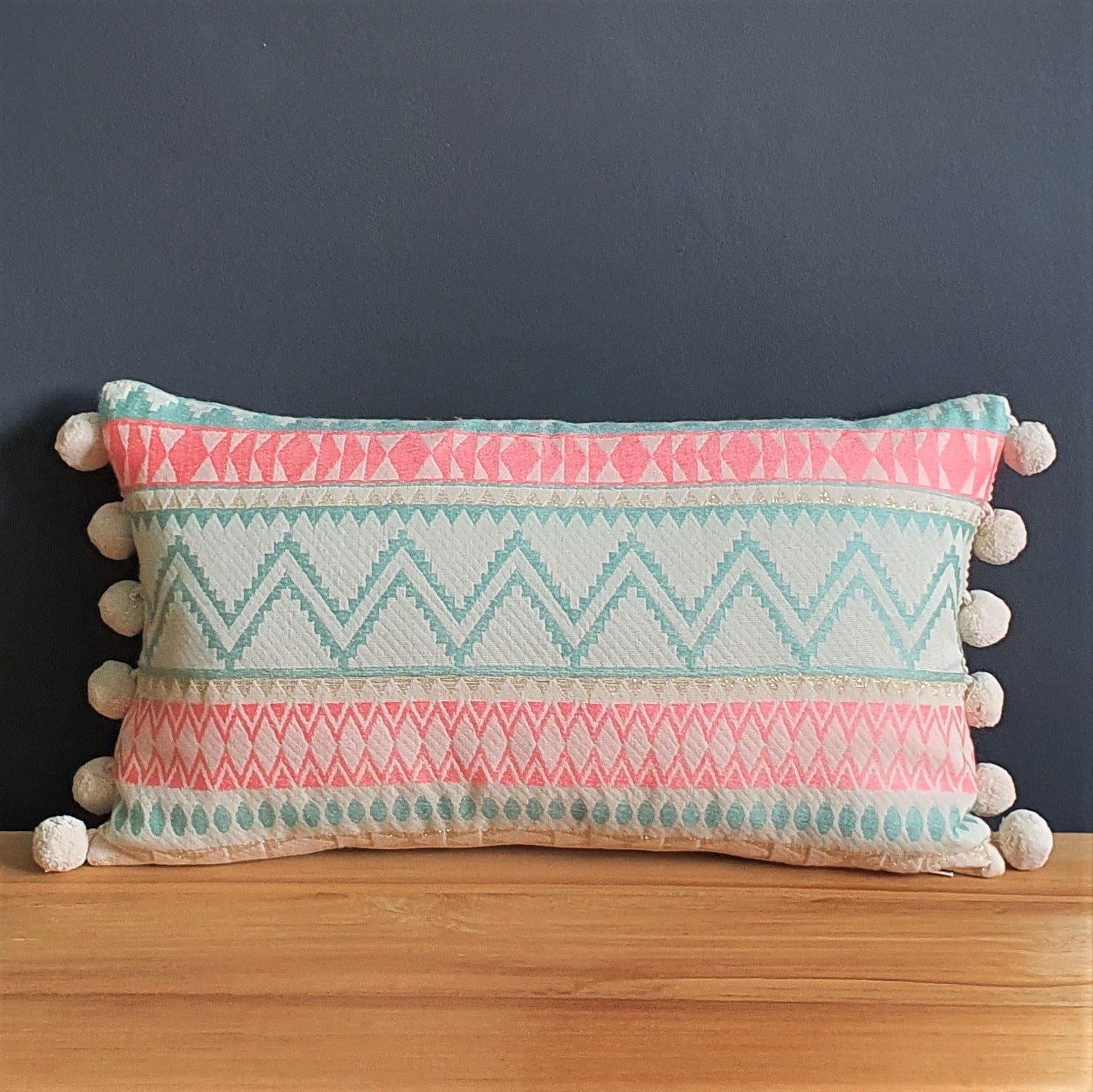 Happy Hour Rectangular Cushion with Pom Poms.