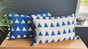 Olivia Large Rectangular Azure Triangle Ikat Cushion with Pom Poms