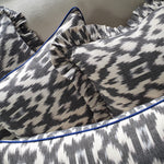 Load image into Gallery viewer, Staffa Square Cushion with Electric Blue piping
